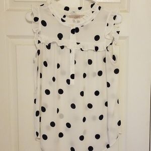 Sleeveless polka dot top with ruffles